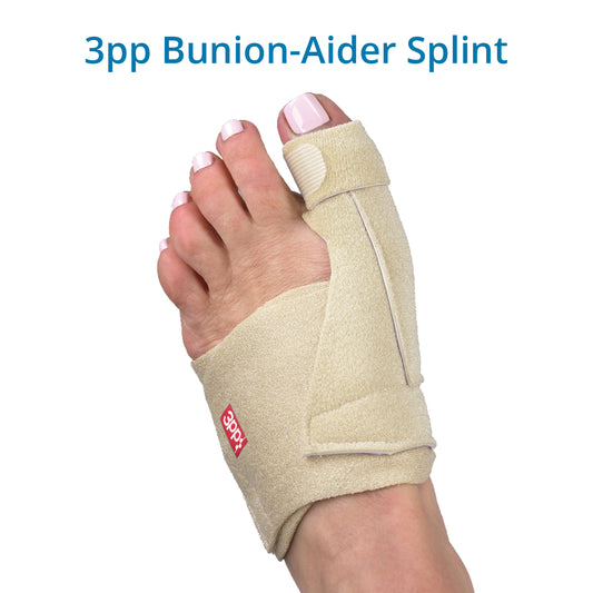 A foot wearing the 3pp Bunion-Aider Splint, which is beige and appears to be made of a soft, flexible material with straps and a support stay.