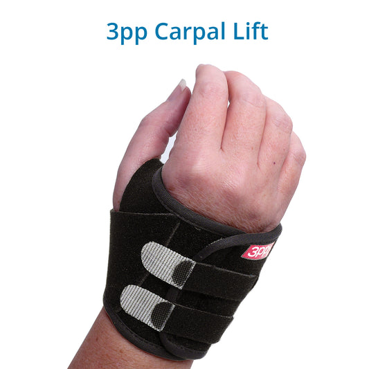 A hand wearing the 3pp Carpal Lift brace, which is black with two gray straps. The Carpal Lift  helps to reduce the pain from Ulnar Sided Wrist Pain, Midcarpal Instability, Triangular Fibrocartilage Complex (TFCC) injuries and other cases of wrist pain.