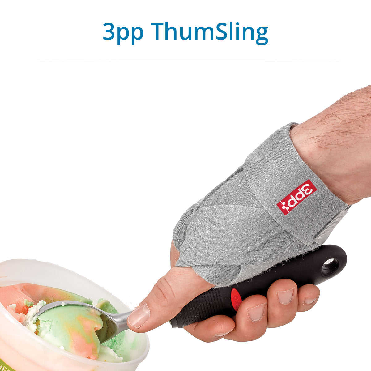 A person’s hand wearing a gray 3pp ThumSling brace supporting the thumb while holding a spoon. Thin and flexible, it provides light, occasional support to relieve pain during gripping or pinching activities